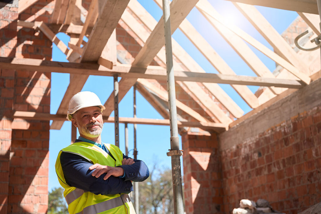 A confidant subcontractor in a house under construction.